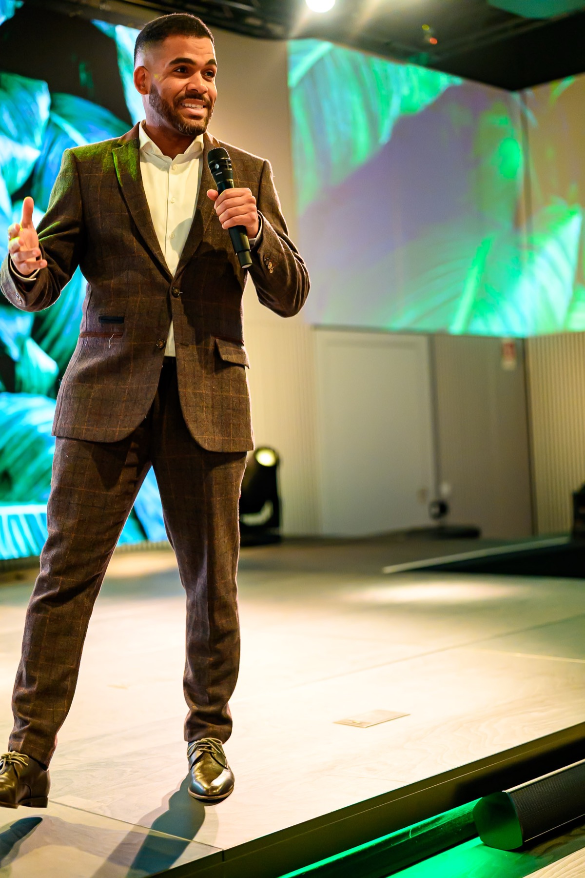 Ludwig Amuam hosting on stage